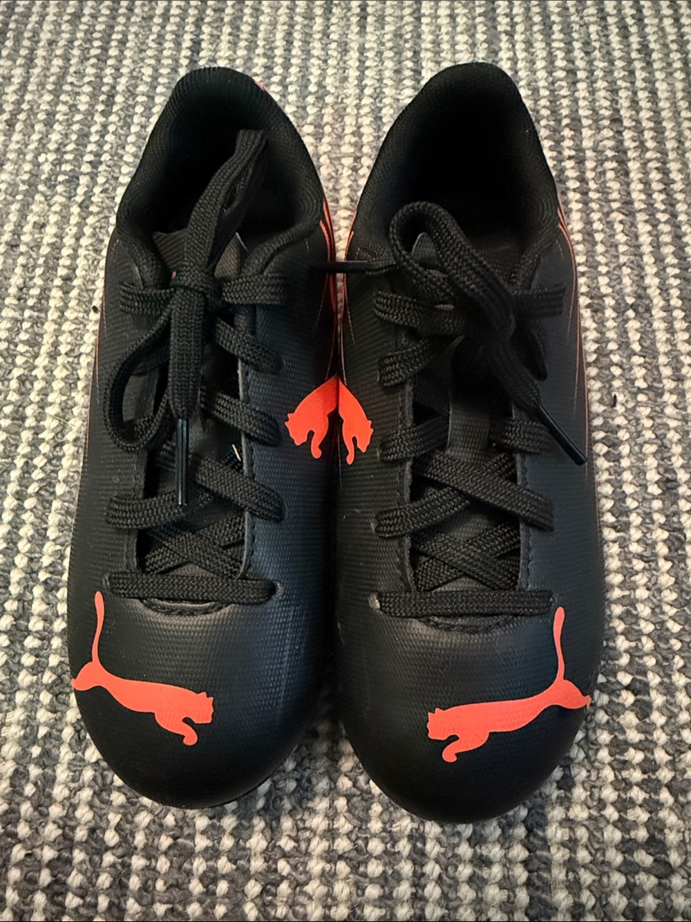 Puma Kids Black and Orange Soccer Cleats